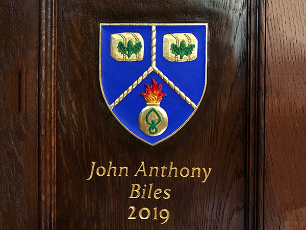 2019 Master's Coat of Arms - Carved in situ on oak panelling